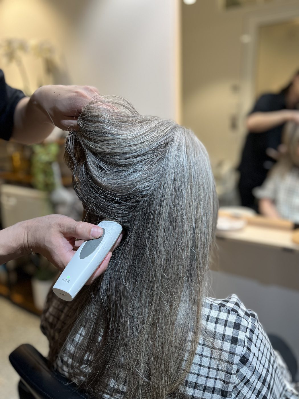 The scalp camera moved through the hair during a consultation