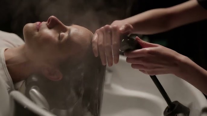 A wet head spa at Dreamin&rsquo;: warm water and steam rising as the scalp is cleansed at the basin