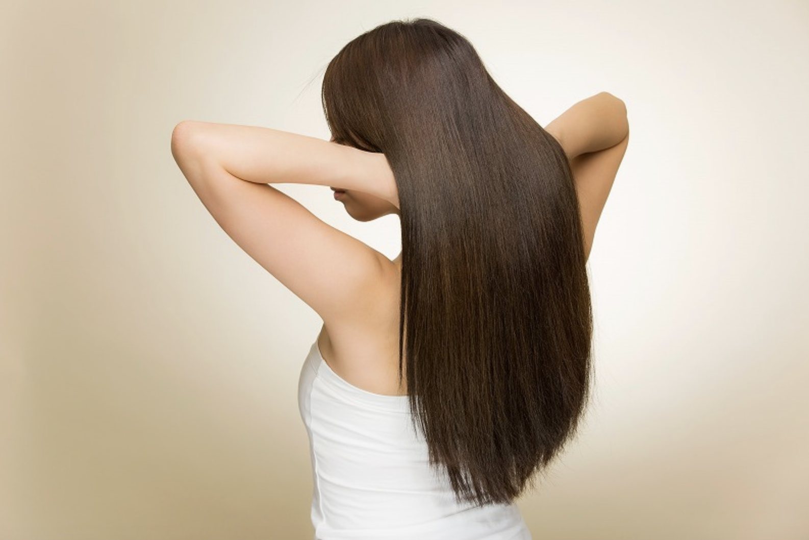 Smooth, sculpted lengths seen from behind in warm light