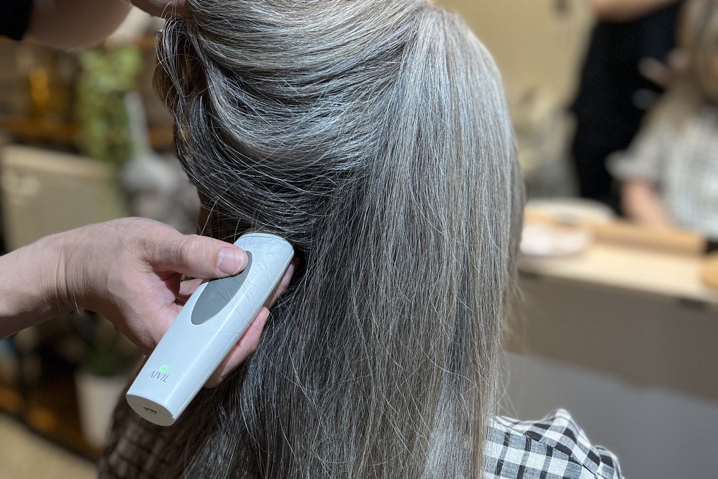 The scalp camera moved through the hair during a consultation at the Southport studio